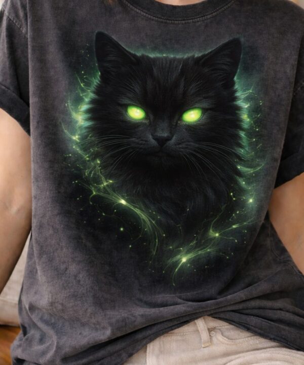 Glowing cat on dark T-shirt design
